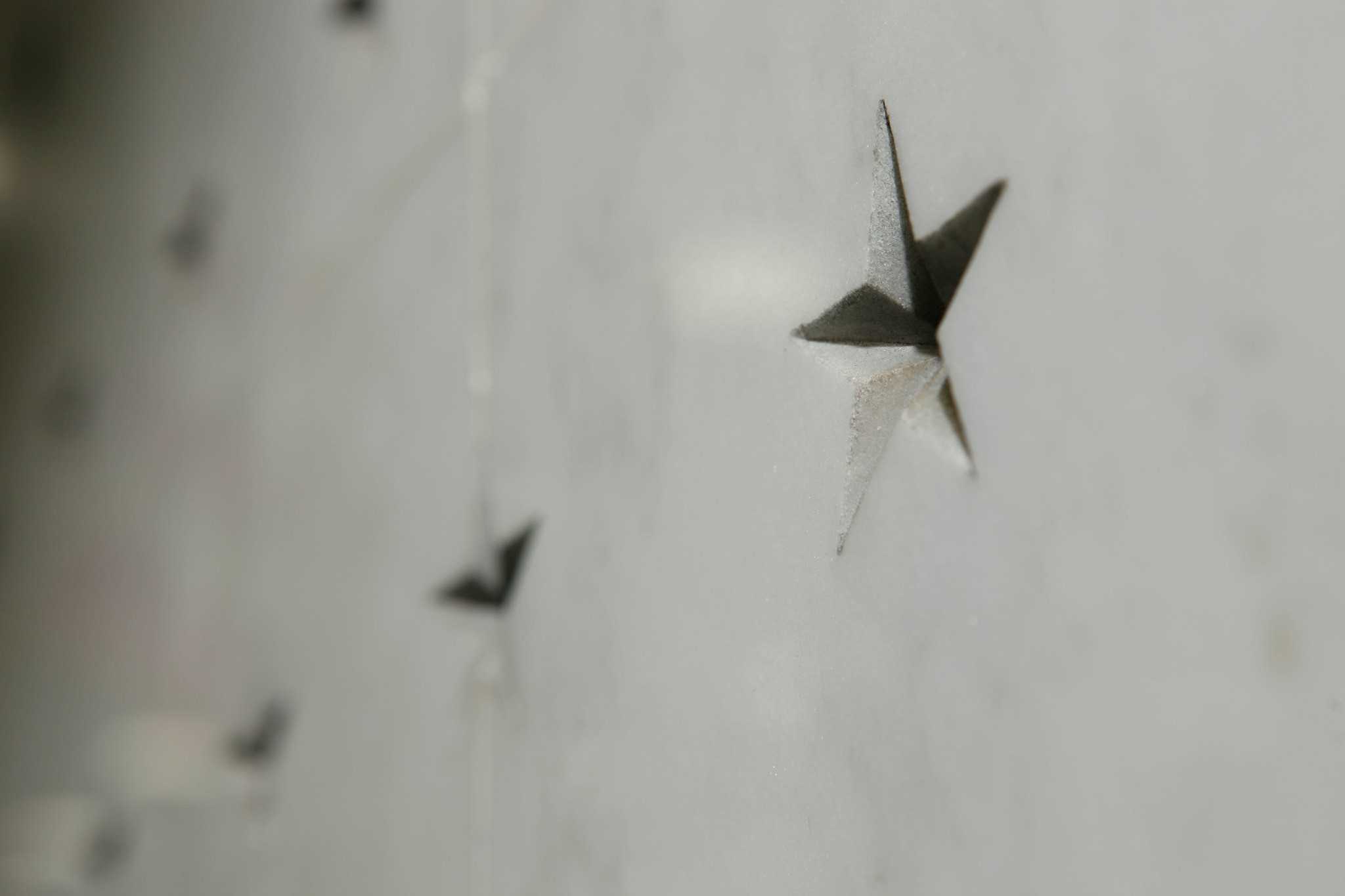 Star-shaped impact mark