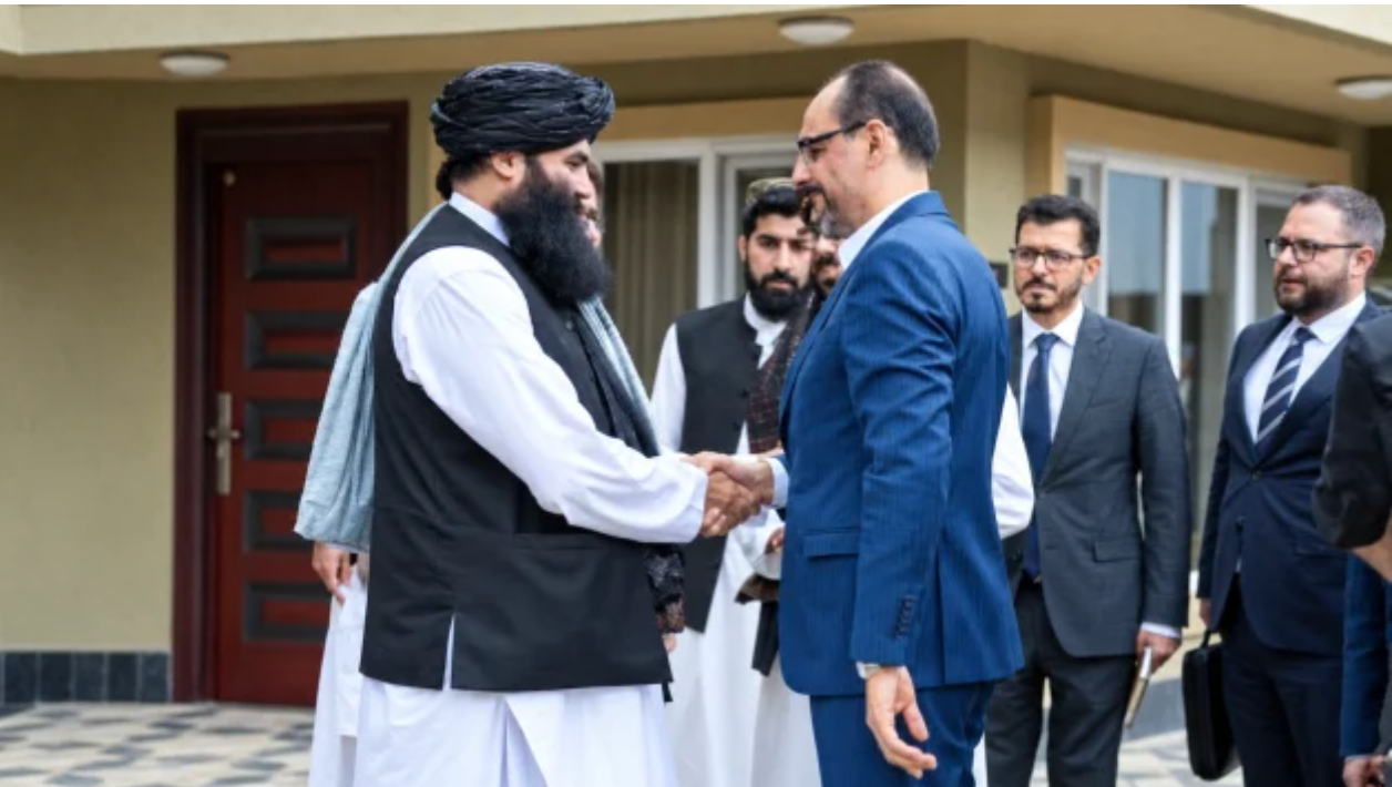 Taliban official greeting a Turkish delegation in Kabul