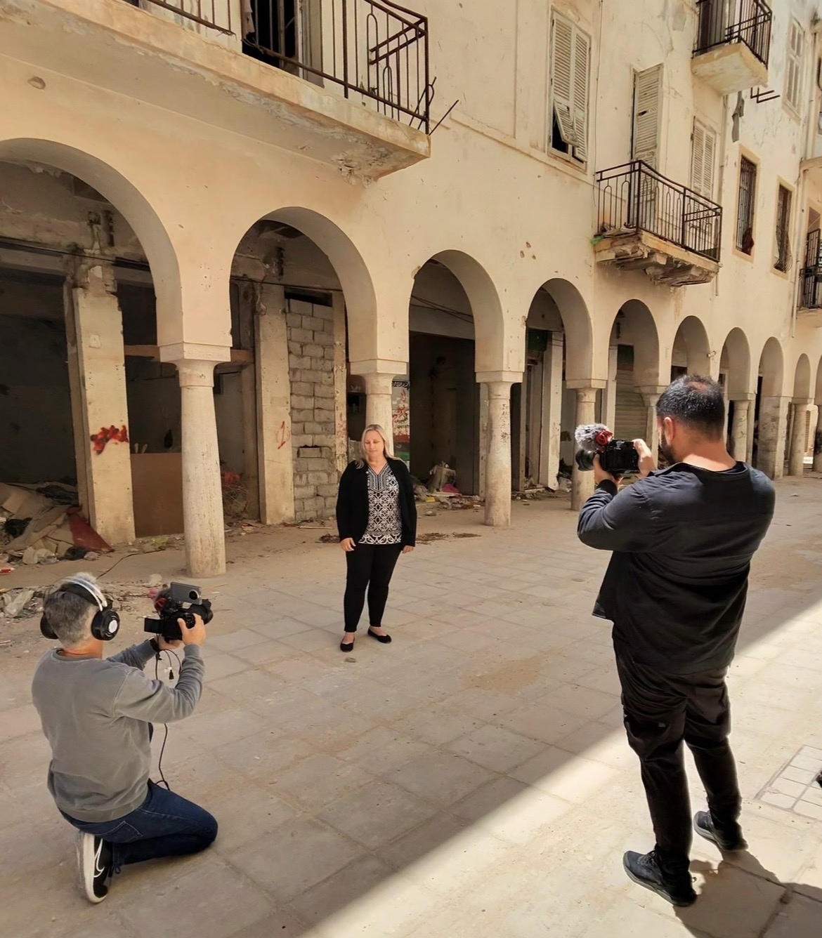 Sarah working with two camera operators