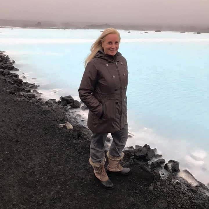 Sarah Adams beside Iceland’s Blue Lagoon